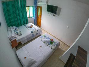 Hotel Arena Azul客房内的一张或多张床位
