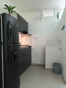 VIP Apartasuites Rosales的厨房或小厨房