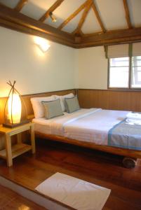 Montalay - Eco Cottage Koh Tao客房内的一张或多张床位