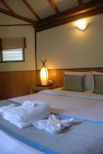 Montalay - Eco Cottage Koh Tao客房内的一张或多张床位