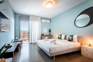 Almogim Suites Eilat客房内的一张或多张床位