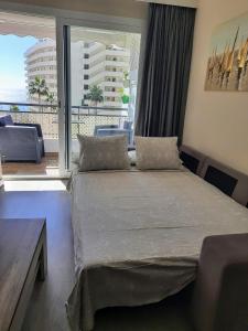 City Center Apartment in Marbella客房内的一张或多张床位