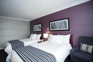 桑德曼威廉斯湖套房酒店客房内的一张或多张床位