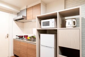 BON Condominium Umeda的厨房或小厨房