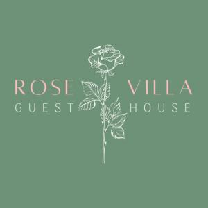 奥本Rose Villa的玫瑰别墅的标志