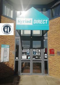 德勒Kyriad Direct Dreux的肯特直销店门上的标志