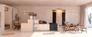 米乔尔海滩Casa Formentera的卧室配有一张床和一张桌子及椅子
