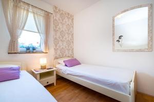Apartments San - comfortable and great location客房内的一张或多张床位