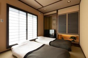 Shirakabanoyado - Seiran客房内的一张或多张床位