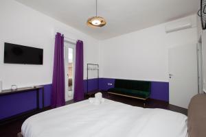 Myrtus Guest House Cagliari客房内的一张或多张床位