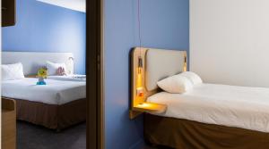 Holiday Inn Express - Le Havre Centre客房内的一张或多张床位
