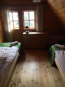 SkiBajkowa Chata客房内的一张或多张床位