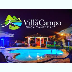 圣罗莎德卡瓦尔Finca Campestre Villa del Campo的读别墅的 ⁇ 花露营标志