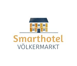 弗尔克马克特Smarthotel Völkermarkt的上面写有smartford伏尔加字迹的房子