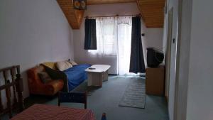 Apartment in Balatonfenyves 18473客房内的一张或多张床位