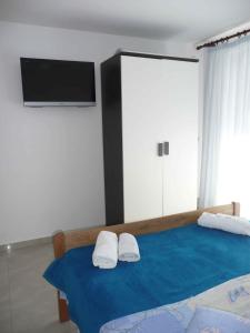 Apartment in Banjol/Insel Rab 17588客房内的一张或多张床位