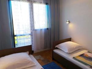 Apartment in Valbandon/Istrien 11260客房内的一张或多张床位