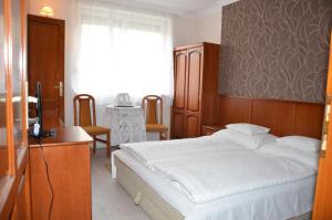 茨埃斯塔佩泽欧酒店客房内的一张或多张床位