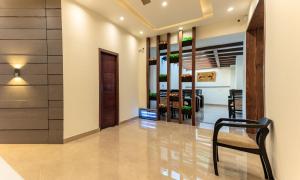 阿姆利则De Manora Homes - Unpretentious hotel with a garden , posh area Ranjit Avenue的相册照片