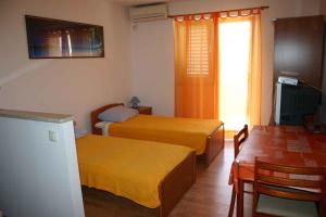 Apartments in Rovinj/Istrien 11700客房内的一张或多张床位