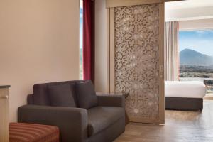 Ramada Encore by Wyndham Muscat Al-Ghubra的休息区