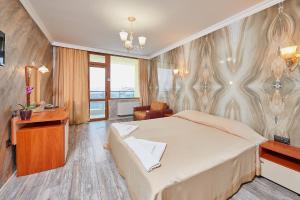 Petar and Pavel Hotel & Relax Center客房内的一张或多张床位