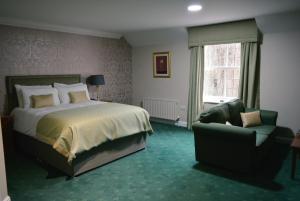 斯塔灵波勒农庄酒店客房内的一张或多张床位