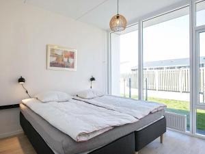 Apartment Ringkøbing IX客房内的一张或多张床位