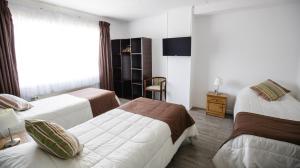 温提思科罗斯旅馆客房内的一张或多张床位