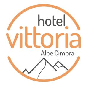 福尔加里亚Hotel Vittoria的山间环抱酒店标志