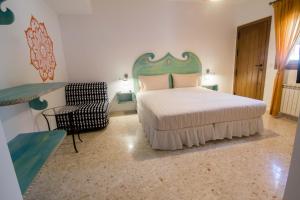 Hostal Casa Arco Iris (Playa)客房内的一张或多张床位