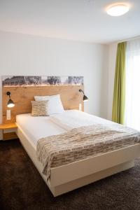 黑恩施瓦温诺旅馆客房内的一张或多张床位