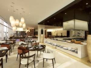 Hyatt Place Dubai Al Rigga Residences餐厅或其他用餐的地方