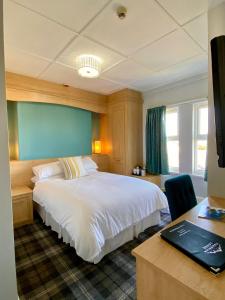 Cumbrian Lodge客房内的一张或多张床位