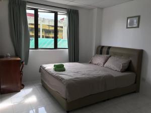 Pangkor Coralbay Resort 201 apartment客房内的一张或多张床位