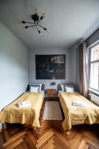 Villa Stara Apteka客房内的一张或多张床位