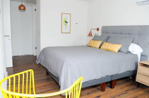 Apartment - Kennedy - Parque Arauco客房内的一张或多张床位