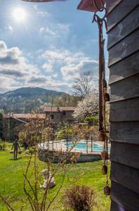 RossanaCasetta nel Bosco Naturas con piscina privata e gratuita的相册照片