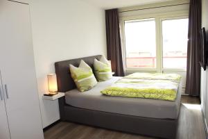 Appartement Amelanderoase 83 im Amelander Paradijs客房内的一张或多张床位