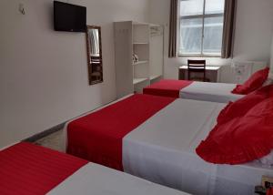玛拉加拉酒店客房内的一张或多张床位