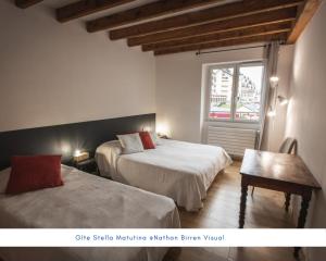 Grand gîte - Stella Matutina客房内的一张或多张床位