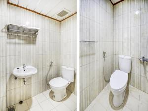 棉兰OYO 90341 Sean's Residence的浴室的两张照片,配有卫生间和水槽
