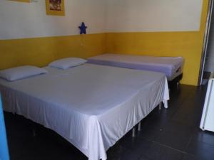 Pousada Aldeia do Sossego客房内的一张或多张床位