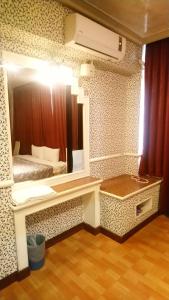 亚都商务旅馆客房内的一张或多张床位