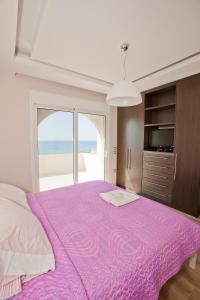 Kiotari Beach Villas - Luxury Retreat客房内的一张或多张床位