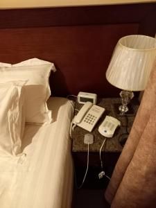 Al Ayniah Hotel客房内的一张或多张床位
