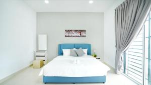 Desaru Home Feel Theme by Joyfully 13M1客房内的一张或多张床位