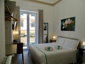 Le Quattro Stagioni - Rooms & Suite客房内的一张或多张床位
