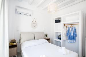 Desire Mykonos Apartments客房内的一张或多张床位