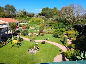 圣维森特费雷拉Quinta dos Sentidos , Rustic Holiday Houses in São Vicente Ferreira的后院,花园,公园